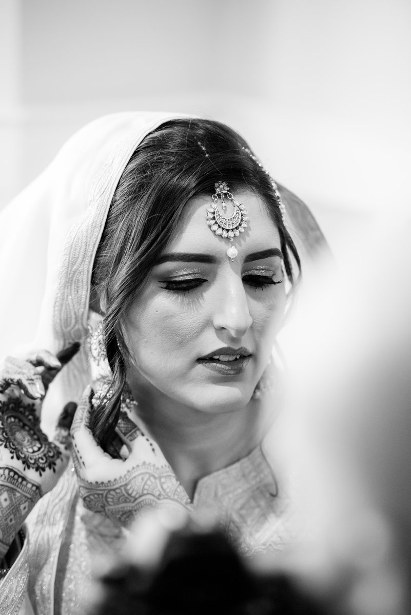 Muslim bride portrait glowing in soft light at Chesapeake Bay Beach Club wedding in Maryland